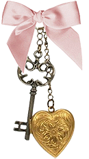 A keychain with a bow, key, and heart-shaped charm.